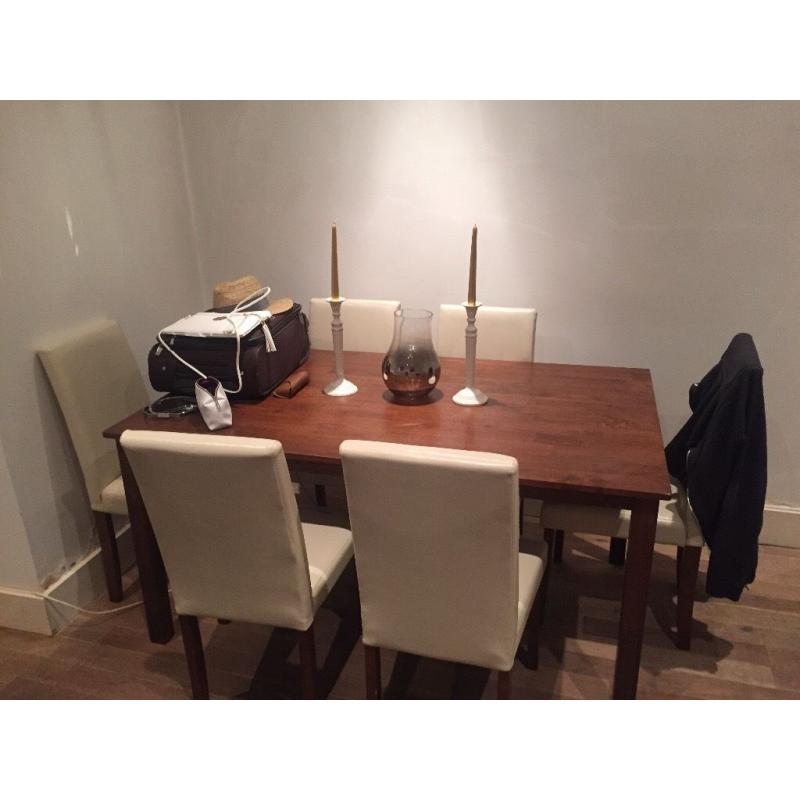 Almost new barely used dining table and chairs