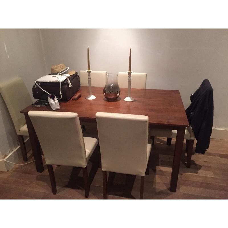 Almost new barely used dining table and chairs