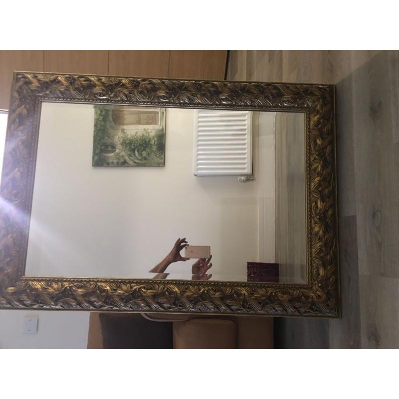 Large rectangular statement mirror with decorative gold border