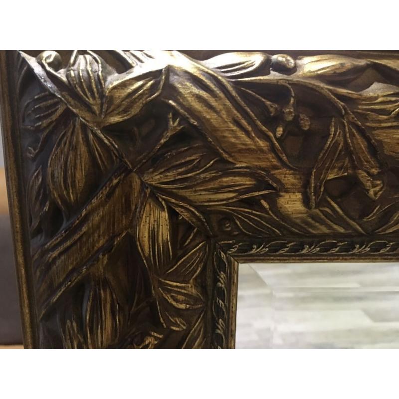 Large rectangular statement mirror with decorative gold border