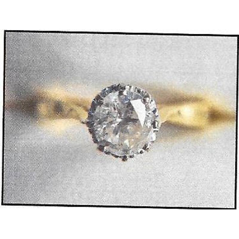 A Solitaire single stone ring brilliant cut Diamond 1.16 Carat hallmarked 18ct yellow gold London.