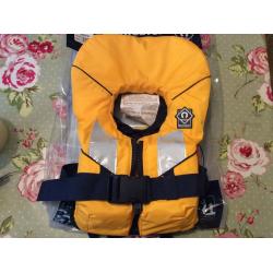 Crew saver spiral life jacket 100N yellow, baby up to 15kg, brand new and unused, orig packaging