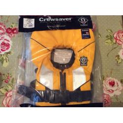 Crew saver spiral life jacket 100N yellow, baby up to 15kg, brand new and unused, orig packaging