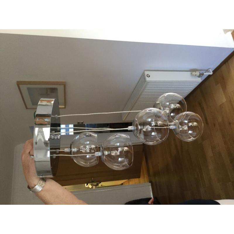 Modern chrome and glass light fitting.
