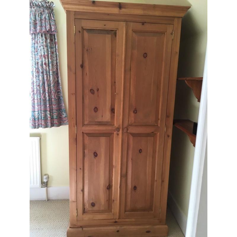 2 double pine wardrobes. vgc. 1 with drawer at bottom. 6ft x 3ft. Will sell separately.