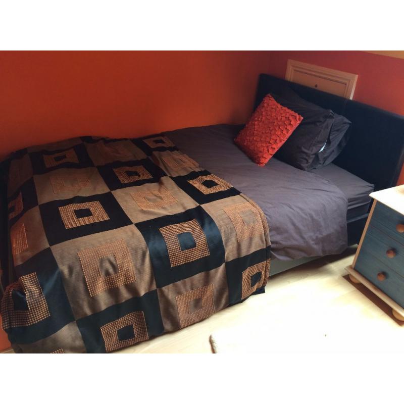 Brown Leather-look double bed in great condition