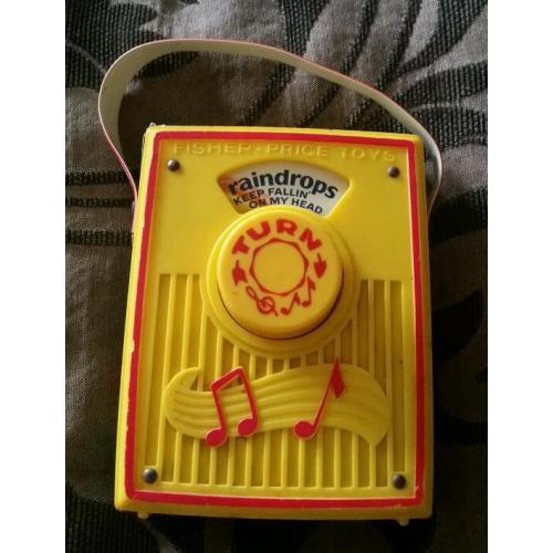 RETRO TOYS - 1970 FISHER PRICE POCKET RADIO ( RAINDROPS KEEP FALLING )