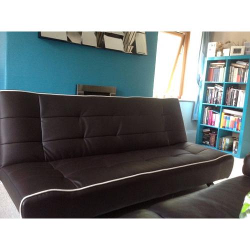Faux leather brown sofa bed click clack