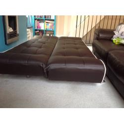 Faux leather brown sofa bed click clack