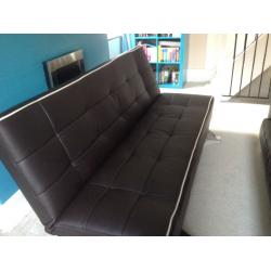 Faux leather brown sofa bed click clack
