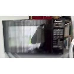 Microwave oven for sale. only 10 moths old. Selling because of move