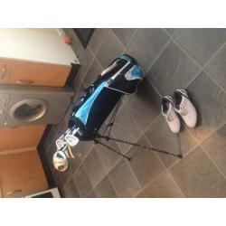 Junior golf set plus extra gilf bag and clubs and putter, plus many extras, golf shoes size 4