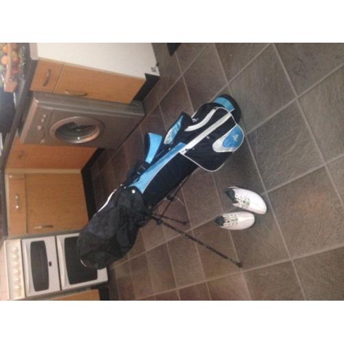 Junior golf set plus extra gilf bag and clubs and putter, plus many extras, golf shoes size 4