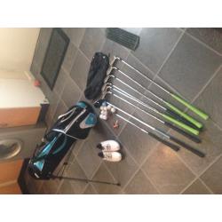 Junior golf set plus extra gilf bag and clubs and putter, plus many extras, golf shoes size 4