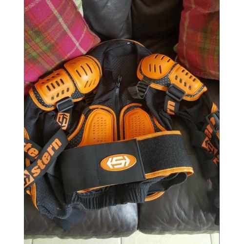 Kids motocross accessories. Wulf boots size 2, body armour top and helmet.