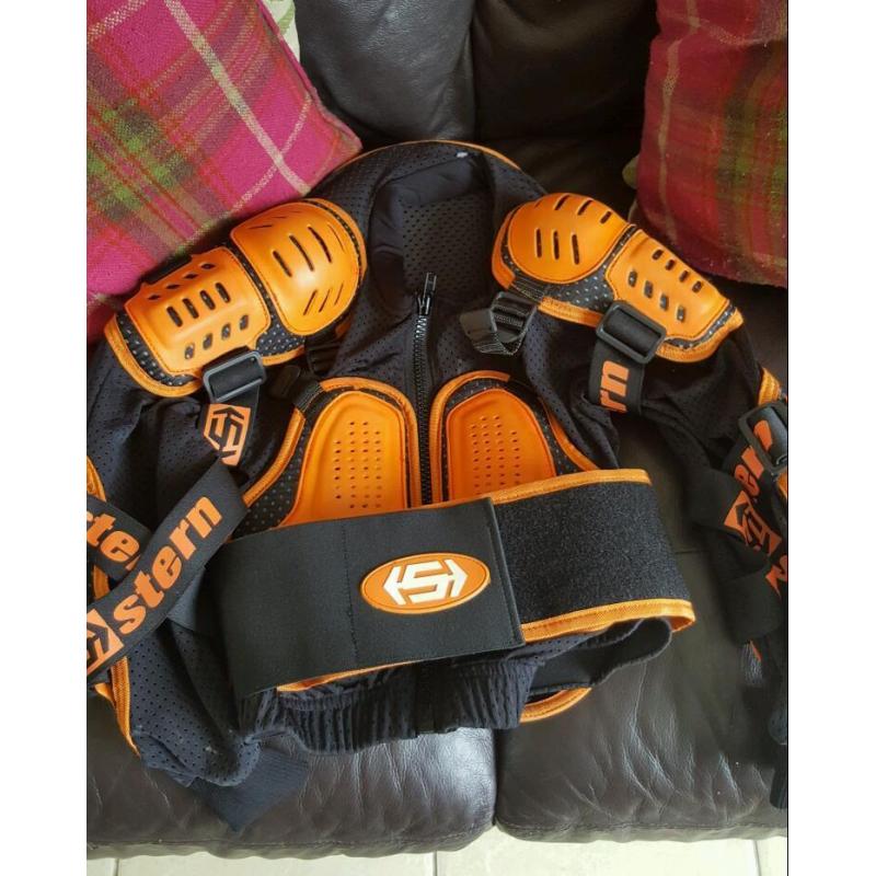 Kids motocross accessories. Wulf boots size 2, body armour top and helmet.