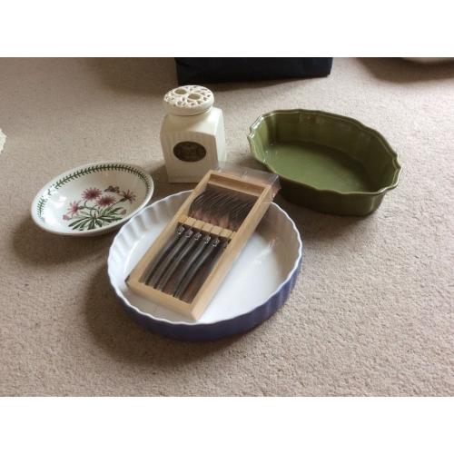 3 ceramic dishes and coffee jar and set of forks.