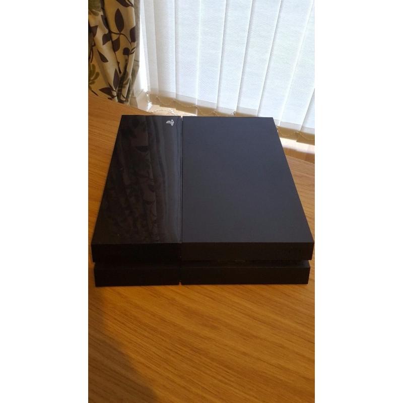 Playstation 4 500gb console - 2 controllers + 4 games ONLY USED HANDFUL OF TIMES.