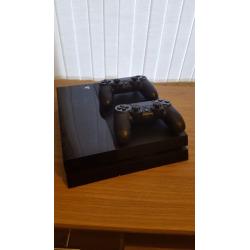 Playstation 4 500gb console - 2 controllers + 4 games ONLY USED HANDFUL OF TIMES.
