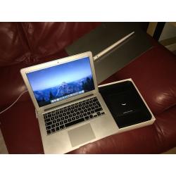 MacBook Air - 13-inch mid-2011. 1.8GHz i7. 256GB SSD. 4GB RAM. Top Spec model for the time.