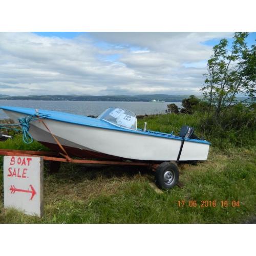 Speedboat with engine on trailer