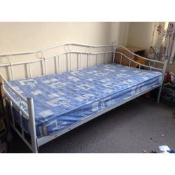 White Metal Day Bed with full size single mattress.