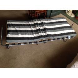 Folding guest bed. Almost new