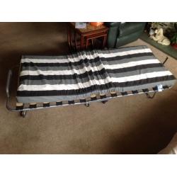 Folding guest bed. Almost new