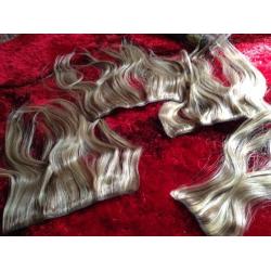 Clip in real hair extensions