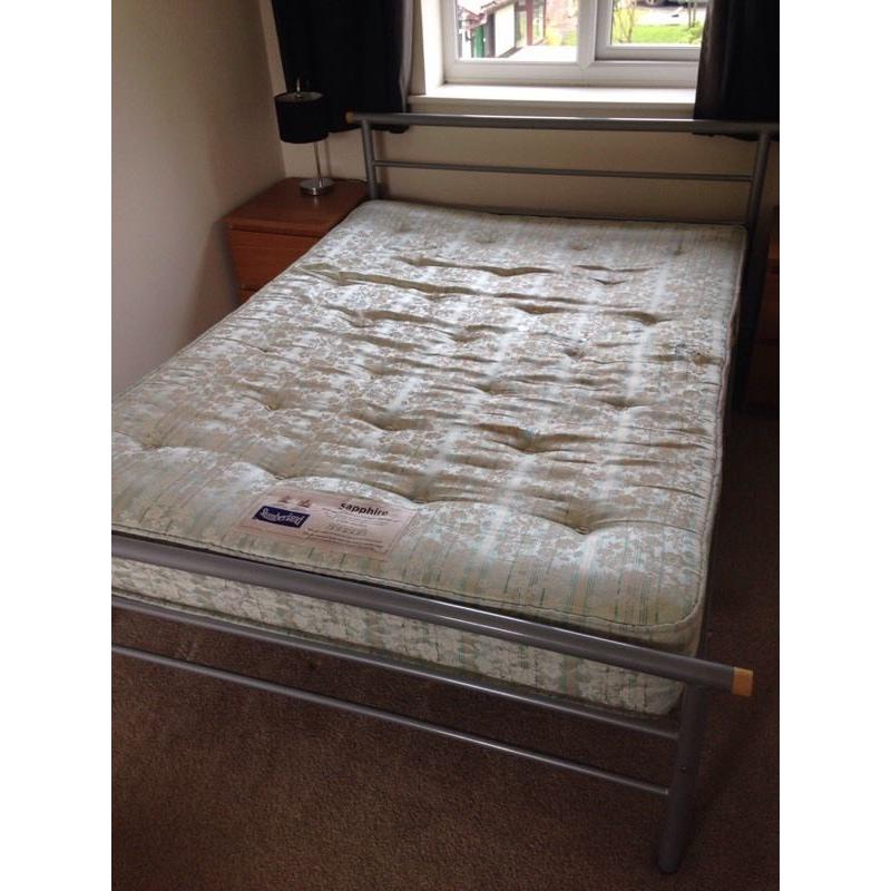 Metal framed double bed with mattress