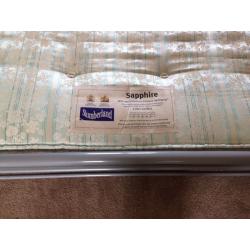 Metal framed double bed with mattress