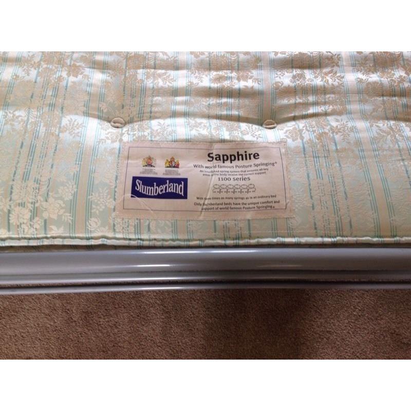 Metal framed double bed with mattress