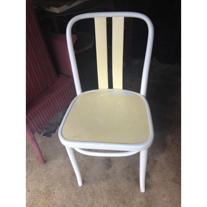 One yellow and white dining chair