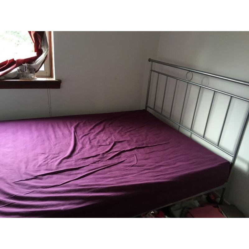 Silver metal framed double bed