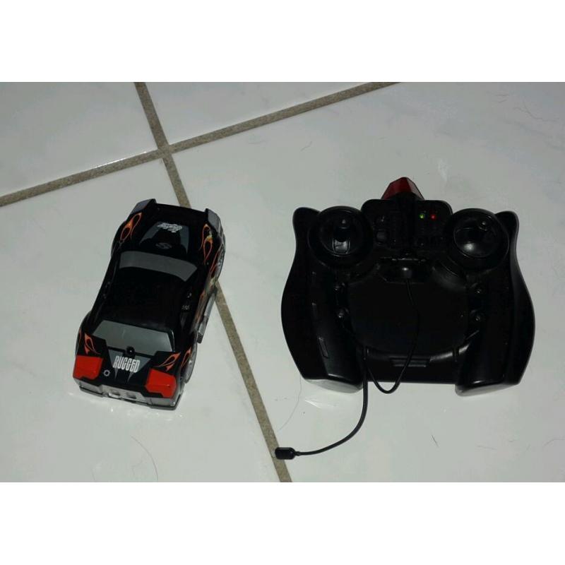 Radio controlled car goes on walls and ceiling. Toy car