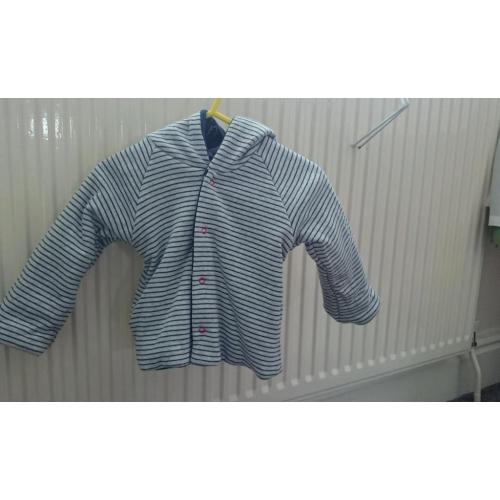 Unisex reversible coat 3-6 months.