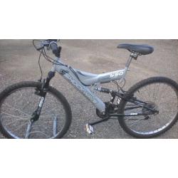 HIS AND HERS FULL SIZE MOUNTAIN BIKES 1 UNISEX AND 1 GENTS