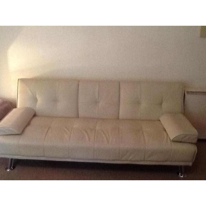 Two ivory Faux Leather Sofa Beds For Sale