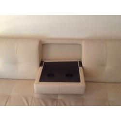 Two ivory Faux Leather Sofa Beds For Sale