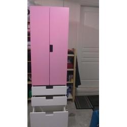Pink and white IKEA stuva wardrobe ideal for nursery or child's room