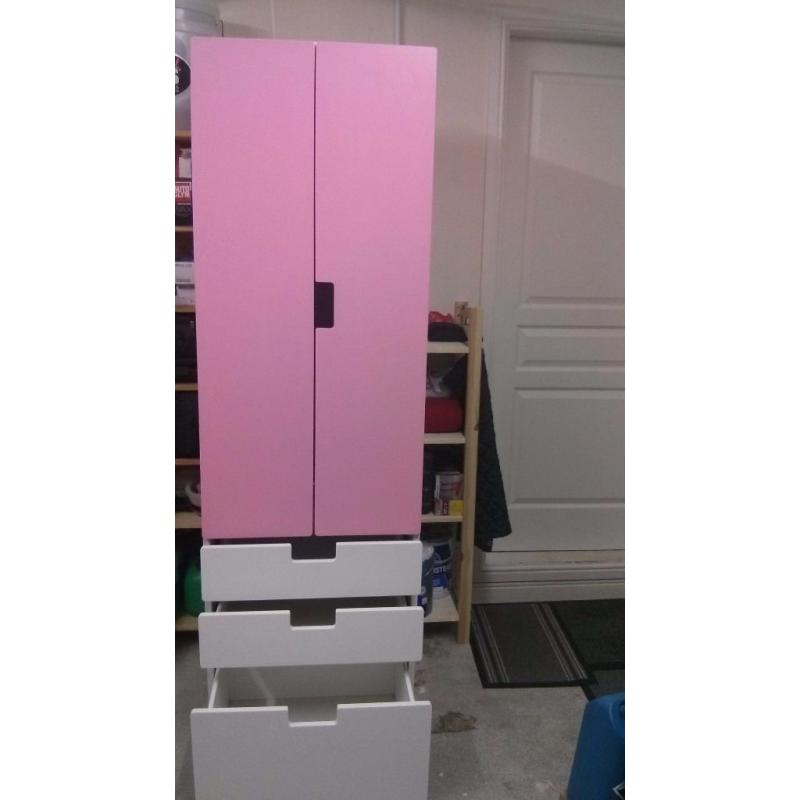 Pink and white IKEA stuva wardrobe ideal for nursery or child's room