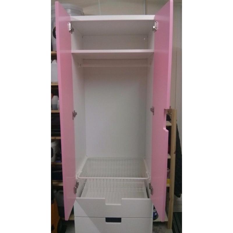 Pink and white IKEA stuva wardrobe ideal for nursery or child's room