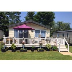 2 year old lodge + huge deck - Weeley bridge nr clacton - as new - fishing lake