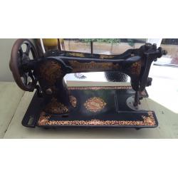 Singer sewing table and Jones machine