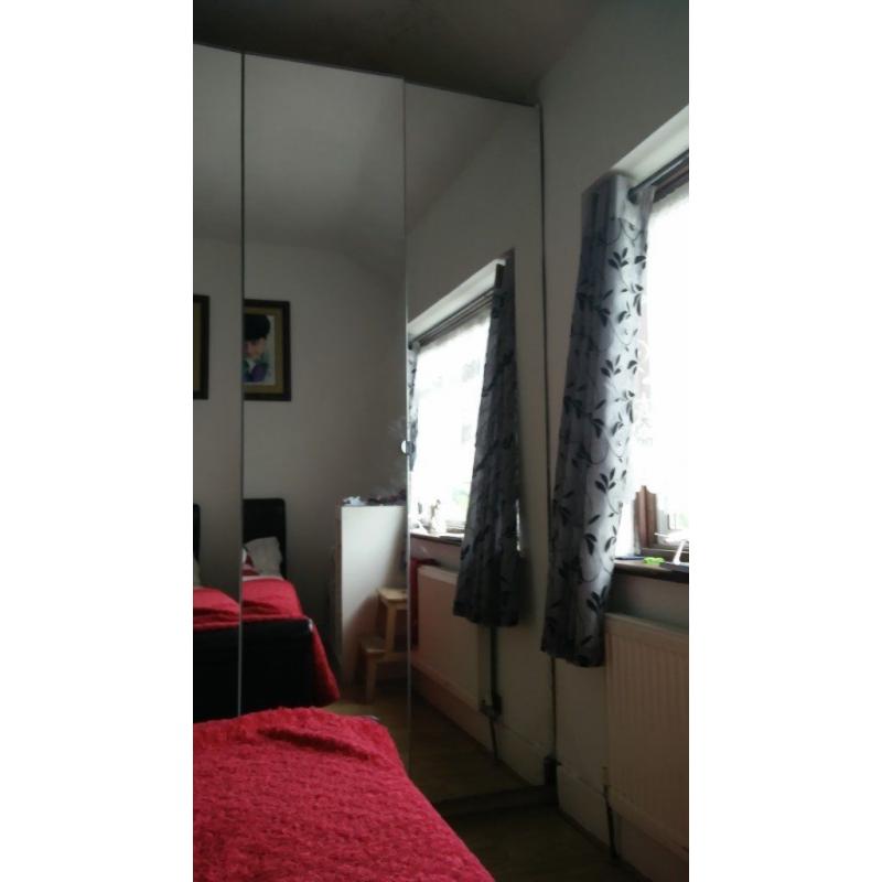 Tall Ikea Wardrobes (3 * 2 Doors and 1 * 1 door) with Glass doors