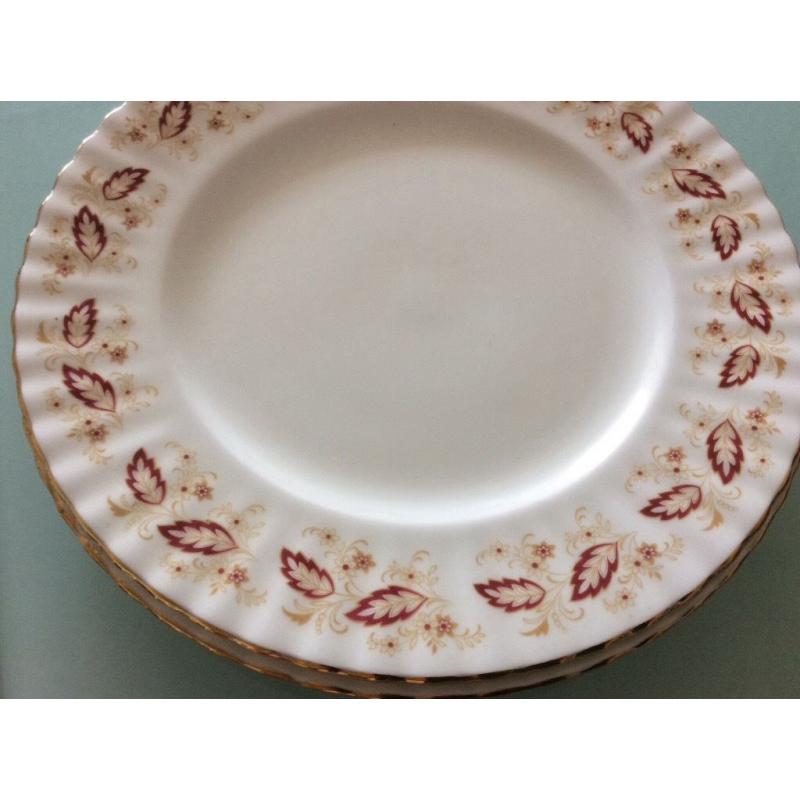 Six English bone china dinner plates