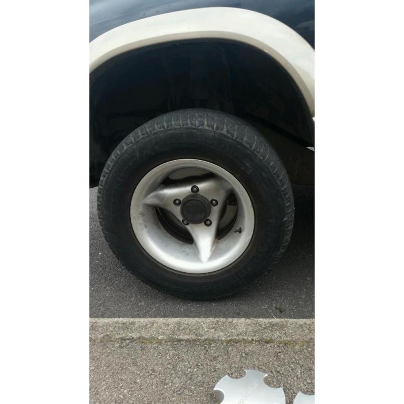 Suzuki vitara alloys and tyres 15s in good condition