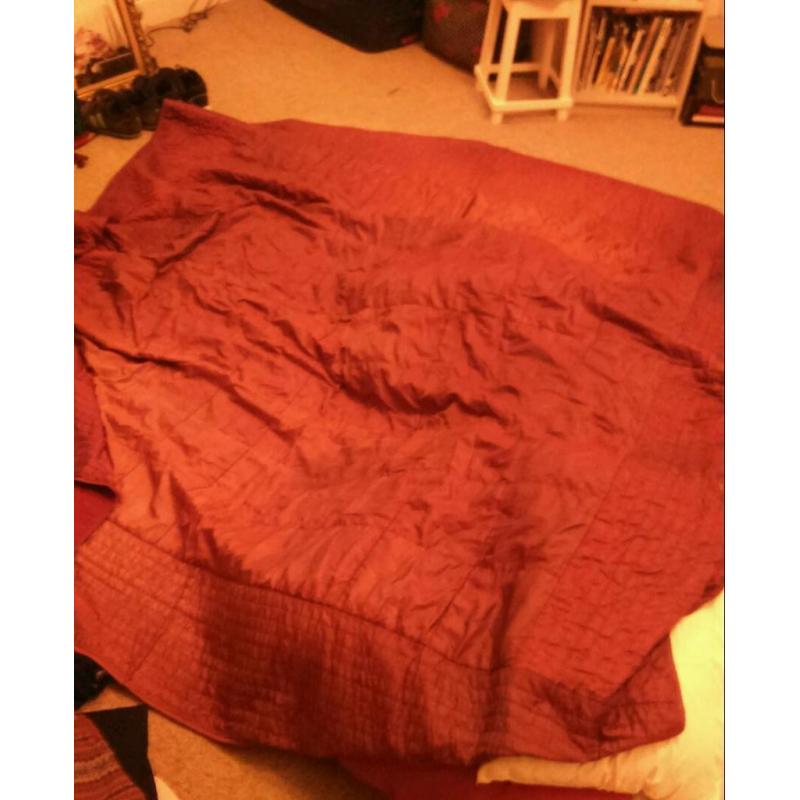 Dark red satin throw