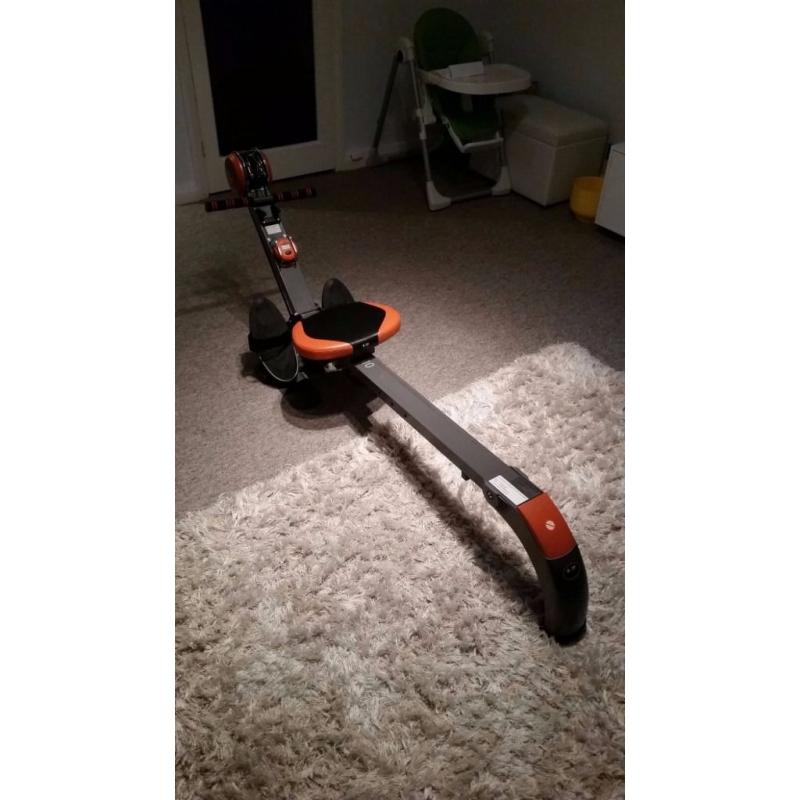 FOLDABLE ROWING MACHINE ORANGE AND GREY