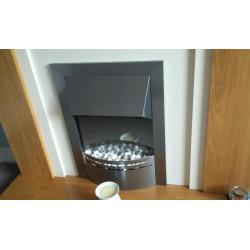 Fire surround and electric dimplex fire